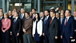FILE - NATO foreign ministers attend a ceremony in Brussels celebrating the 75th anniversary of NATO's creation, April 4, 2024. The organization also will mark its anniversary with a summit next week in Washington.