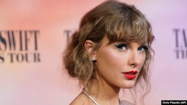 FILE- Taylor Swift arrives at the world premiere of the concert film "Taylor Swift: The Eras Tour," Oct. 11, 2023, at AMC The Grove 14 in Los Angeles.