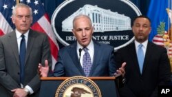 Assistant Attorney General Matthew Olsen of the Justice Department's National Security Division speaks during a news conference at the Department of Justice in Washington, May 16, 2023.
