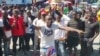 Manifestan Okap Pran Lari pou Egzije Enstalasyon Konsèy Prezidansyèl Pati Pitit Dessalines nan 