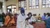 FILE - Muslim perform Eid Al-Fitr prayers, that marks the end of the Holy month of Ramadan, at the Tsinga Mosque in Yaounde, May 2, 2022. 