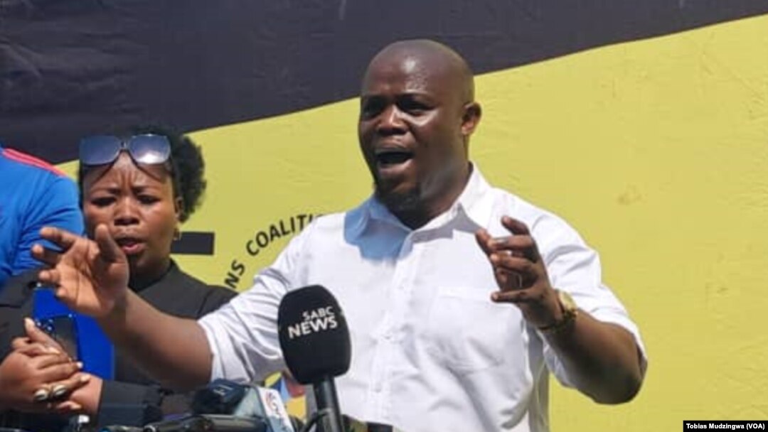 Promise Mkhwananzi addressing a CCC press conference in Harare.