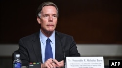 FILE - Nicholas Burns testifies before the Senate Foreign Relations Committee confirmation hearing on his nomination to be ambassador to China, on Capitol Hill in Washington, on Oct. 20, 2021.