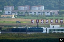 A train resembling one used by Kim Jong Un on his previous travels is seen on the North Korea border with Russia and China from China's Yiyanwang Three Kingdoms viewing platform in Fangchuan in northeastern China's Jilin province, Sept. 11, 2023.