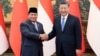 Chinese President Xi Jinping, at right, shakes hands with Indonesian President-elect Prabowo Subianto at the Great Hall of the People in Beijing on April 1, 2024, in this photo released by Xinhua News Agency.