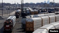 FILE - A Canadian Pacific Railway (CP Rail) locomotive backs into position at the company's Toronto Yard in Scarborough, Ontario, Canada, March 20, 2022. 