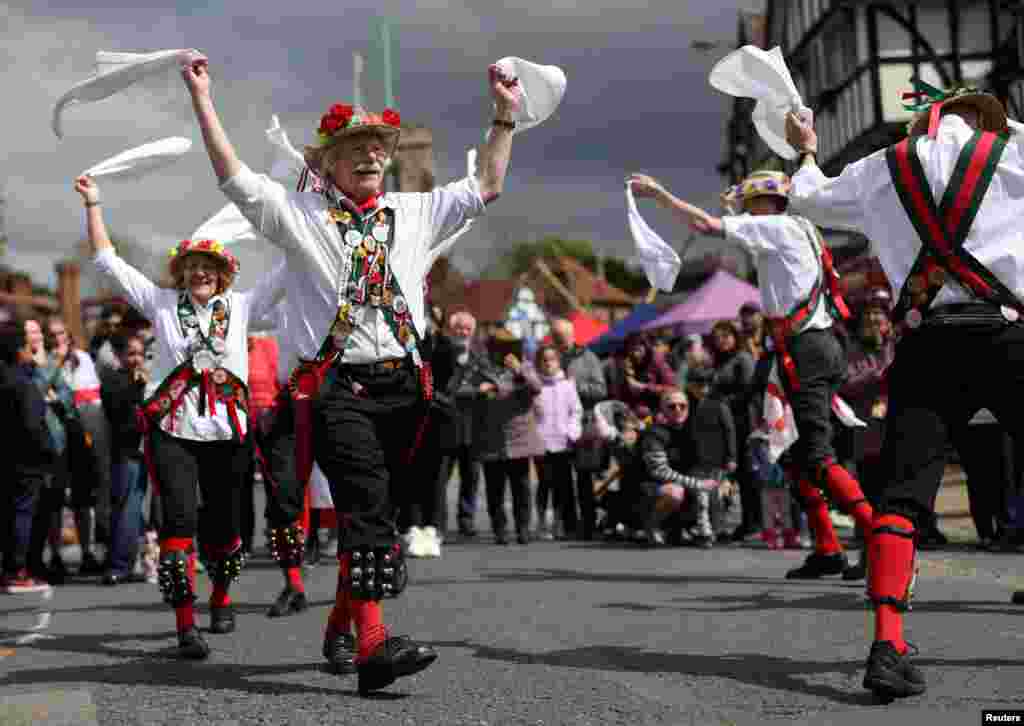 People perform during the St. George&#39;s Day celebration in northwest London.