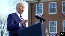 FILE - President Joe Biden speaks on the grounds of Morehouse College and Clark Atlanta University, Jan. 11, 2022, in Atlanta. 