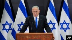 Israeli Prime Minister Benjamin Netanyahu speaks to the media during a press conference, in Tel Aviv, Israel, April 10, 2023.