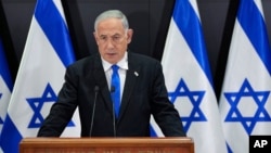 FILE - Israeli Prime Minister Benjamin Netanyahu speaks to the media during a press conference, in Tel Aviv, Israel, April 10, 2023.