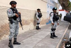 Mexican National Guard members prepare a search mission for four U.S. citizens kidnapped by gunmen at Matamoros, Mexico, March 6, 2023.