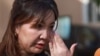 FILE - Journalist Unurtsetseg Naran reacts after a preliminary hearing outside a court in Mongolia's capital, Ulaanbaatar, on May 28, 2024. Unurtsetseg was sentenced to four years and nine months in prison on July 19, 2024.