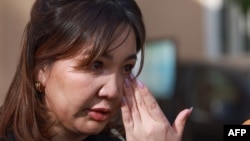 FILE - Journalist Unurtsetseg Naran reacts after a preliminary hearing outside a court in Mongolia's capital, Ulaanbaatar, on May 28, 2024. Unurtsetseg was sentenced to four years and nine months in prison on July 19, 2024.