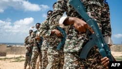 FILE - Troops take part in Somali army training in Mogadishu on March 19, 2024. Two government soldiers are among the 12 dead in fighting with local militias near the border with Ethiopia on July 16, 2024.