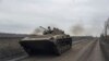 Український танк на позиціях біля Бахмуту, 1 березня 2023. AP/Evgeniy Maloletka