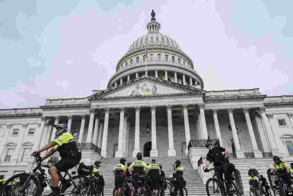 U.S. Capitol Police and NYPD officers stand in front of the Capitol ahead of Israeli Prime Minister Benjamin Netanyahu's speech to a joint meeting of Congress, July 24, 2024, in Washington. 