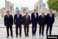 FILE - U.S. Secretary of State John Kerry stands with Kazakhstan Foreign Minister Erlan Idrissov, Kyrgyzstan Foreign Minister Erlan Abdyldaev, Tajikistan Foreign Minister Aslov Sirodjidin, Turkmenistan Foreign Minister Raşit Meredow, and Uzbekistan Foreign Minister Abdulaziz Kamilov in front of Registan in Samarkand, Uzbekistan, Nov. 1, 2015.