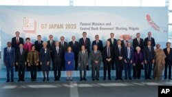 Group of Seven finance ministers and central bank governors with invited non-G7 countries' counterparts attend a photo session at Toki Messe in Niigata, Japan, May 12, 2023.