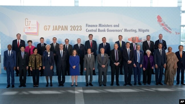 Group of Seven finance ministers and central bank governors with invited non-G7 countries' counterparts attend a photo session at Toki Messe in Niigata, Japan, May 12, 2023.