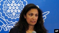 FILE - Uzra Zeya, then the acting U.S. undersecretary of state for democracy and human rights, speaks to reporters Aug. 2, 2013, in Beijing.