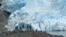 FILE - A group of people take in the views of the Mendenhall Glacier on June 8, 2023, in Juneau, Alaska.