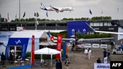This photograph taken on June 19, 2023 shows a the landing of the Airbus A321 XLR as French President visits the International Paris Air Show at the Paris' Le Bourget Airport. 
