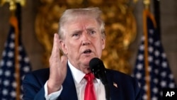 Republican presidential nominee former President Donald Trump speaks to reporters during a news conference at his Mar-a-Lago estate Aug. 8, 2024, in Palm Beach, Fla.