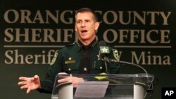 Orange County Sheriff John Mina addresses the media during a press conference about multiple shootings, Feb. 22, 2023, in Orlando, Fla.