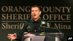 Orange County Sheriff John Mina addresses the media during a press conference about multiple shootings, Feb. 22, 2023, in Orlando, Fla.