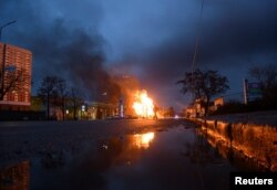 A fire burns after a Russian missile strike in Kyiv, Ukraine, Jan. 2, 2024.