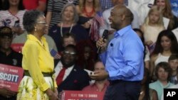 Tim Scott, a Republican senator from South Carolina, welcomes his mother, Frances Scott, on stage as he gives remarks at his presidential campaign announcement event at Charleston Southern University, on May 22, 2023, in North Charleston, S.C. 