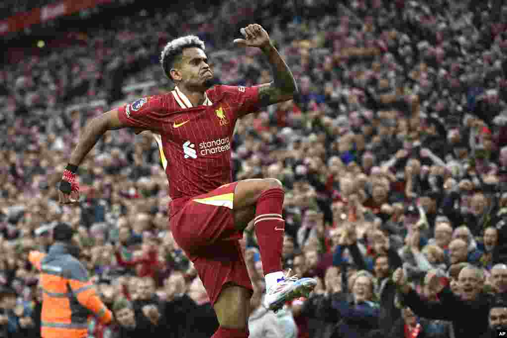 Liverpool&#39;s Luis Diaz celebrates after scoring his side&#39;s opening goal during the English Premier League soccer match between Liverpool and Brentford at Anfield Stadium, Liverpool, England.