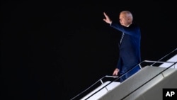 US President Joe Biden arrives at Indira Gandhi International Airport to attend the G20 summit, Sept. 8, 2023, in New Delhi.