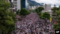 FILE - Protesters demonstrate against the National Election Council certification of President Nicolas Maduro's reelection in Caracas, Venezuela, July 30, 2024, two days after the presidential vote.