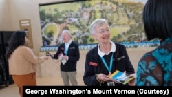 At the Mount Vernon Estate in Alexandria, Virginia, volunteers hand out brochures to visitors. Volunteering these days includes everything from helping out at a community festival to participating in a race for a good cause.