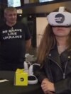 VR exhibition walks viewers through war-torn Ukraine