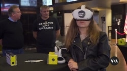 VR exhibition walks viewers through war-torn Ukraine