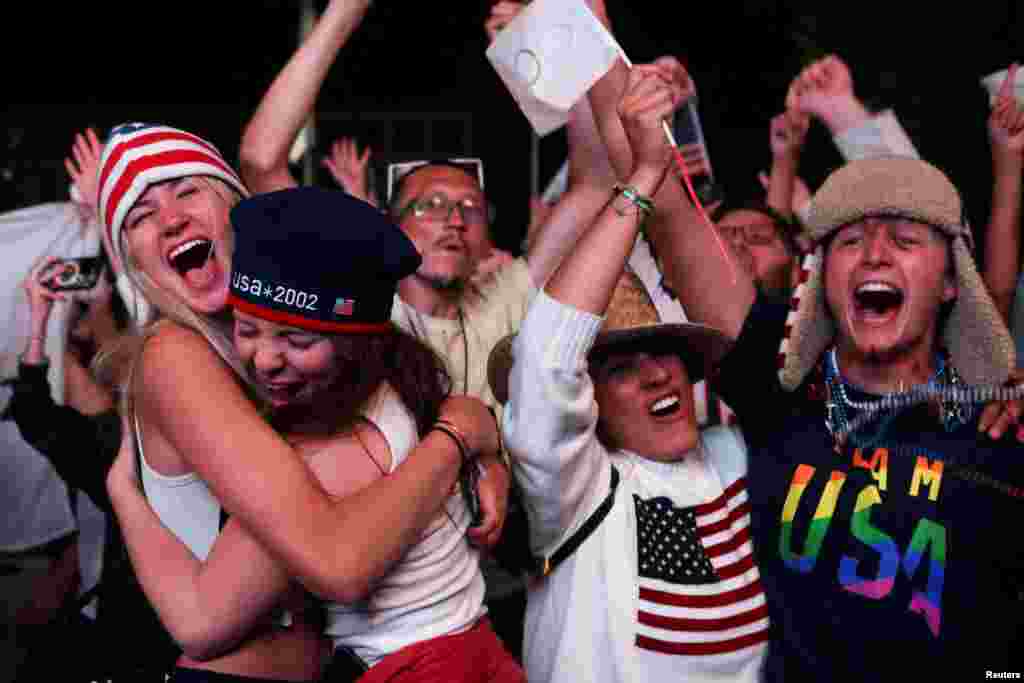 People celebrate the announcement as Salt Lake City is officially awarded the rights to host the 2034 Winter Olympic and Paralympic Games, in Salt Lake City, Utah.