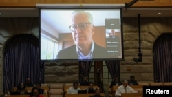 Former Eskom Chief Executive Officer Andre de Ruyter appears virtually before South African parliament's standing committee on public accounts to explain his allegations of corruption in the struggling utility, in Cape Town, South Africa, April 26, 2023. 