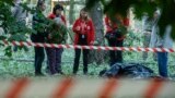 Жительница Киева у тела погибшей дочери
