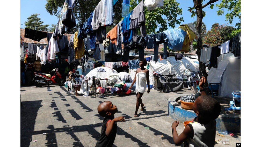 Children play in the courtyard of a shelter for families displaced by gang violence, in Port-au-Prince, Haiti, March 14, 2024.