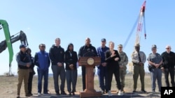 Maryland Gov. Wes Moore speaks at a news conference at Tradepoint Atlantic in Sparrows Point, Md., on March 29, 2024, with officials gathered to discuss efforts to remove wreckage from the collapse of the Francis Scott Key Bridge Bridge.