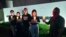In this image taken and provided by Anti-Death Penalty Asia Network, members of Anti-Death Penalty Asia Network (ADPAN) hold candle outside Singapore Embassy in Kuala Lumpur, Malaysia, April 26, 2023.