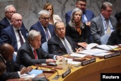 United Nations Secretary-General Antonio Guterres speaks as Russian Foreign Minister Sergey Lavrov looks on durind a meeting of the U.N. Security Council at U.N. headquarters in New York, April 24, 2023.