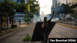 In photos: Venezuelans step up protests after Maduro declares election victory