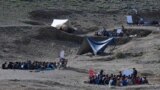 Afghan children attend an open-air school in Yaqubi in Sabari district of Khost province.