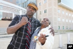 Eddie Terrell Parker and his aunt, Linda Rawls, express their joy at the 40-year prison sentence given to former Rankin County Sheriff's Deputy Christian Dedmon, March 20, 2024, in Jackson, Miss., for his part in the torture of Parker and another man.