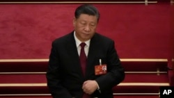 2023 年3月5日，中國國家主席習近平出席在北京人民大會堂舉行的全國人民代表大會開幕式。 （美聯社照片/Ng Hanguan）