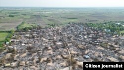 စစ်ကောင်စီနယ်မြေရှင်းလင်းရေးအတွင်း စစ်ကိုင်းတိုင်း စစ်ကိုင်းမြို့နယ်ထဲက မီးဘေးသင့်ကျေးရွာတရွာကိုတွေ့ရစဉ် (မေ၊ ၂၀၂၃)