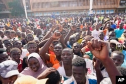 Young people gather in Niamey, Niger, to register as volunteers and fighters in support of the junta, Aug. 19, 2023.